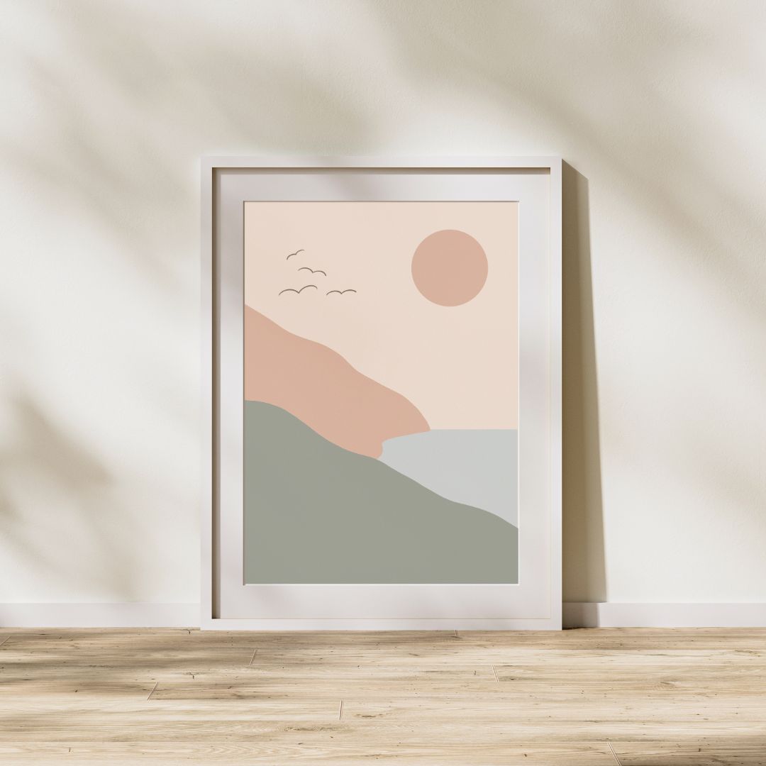 Framed abstract art print with a minimalistic design on a wooden surface.
