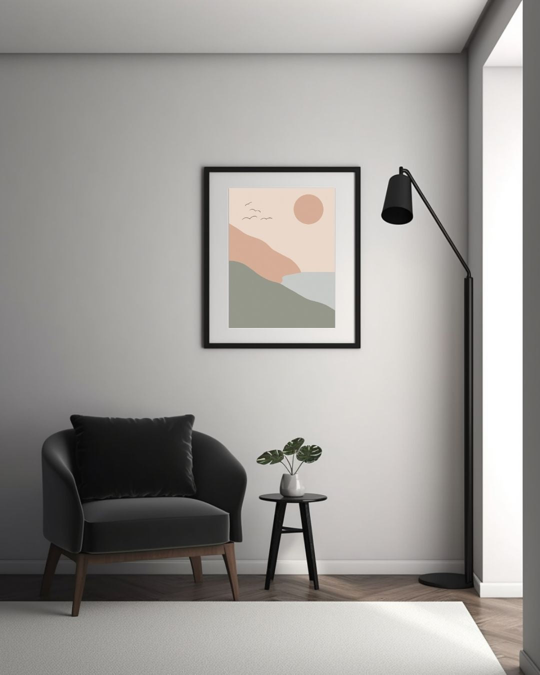 Modern interior with a gray armchair, small table, and abstract art on a gray wall.