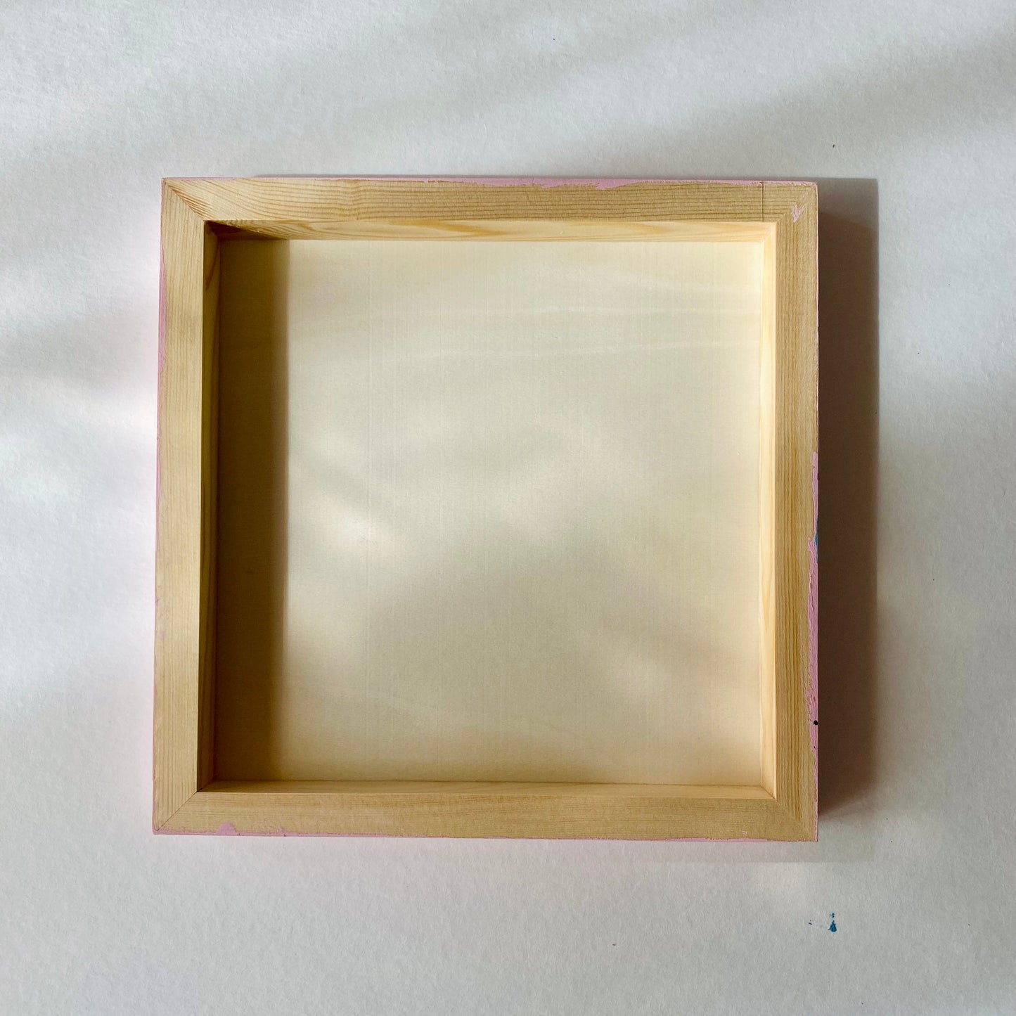 Wooden picture frame on a white background
