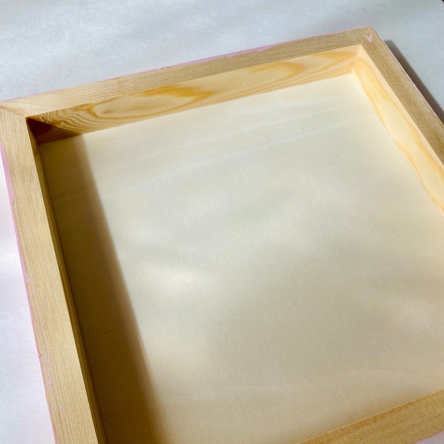 Wooden picture frame on a white background