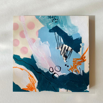 Abstract painting with colorful brush strokes on a light background