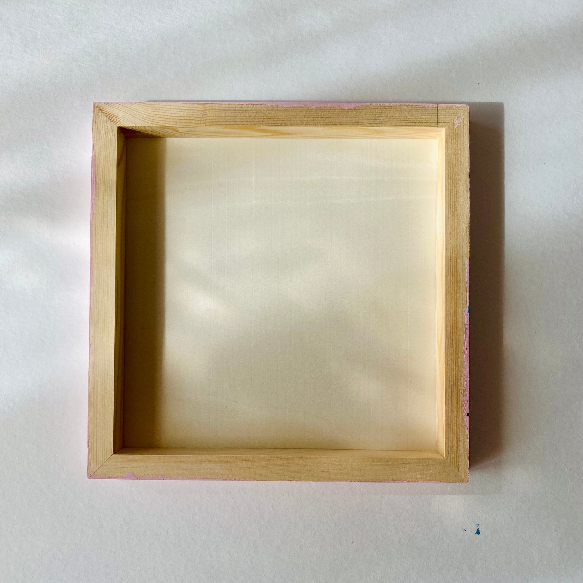 Wooden picture frame on a white background